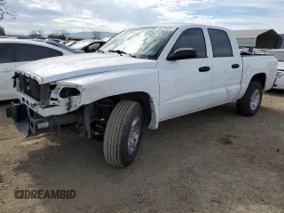 2005 Dodge Dakota SLT with VIN 1D7HE48N35S263600, listed as a Copart auction lot 46705555 with 128,519 mi miles and Salvage Title. Bid and sale history available at DreamBid. Image 1.