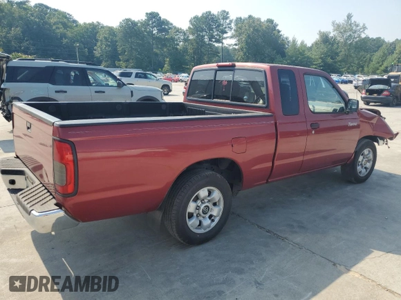 2000 Nissan Frontier XE with VIN 1N6DD26SXYC393054, listed as a Copart auction lot 62410125 with 106,319 mi miles and Salvage title. Bid and sale history available at DreamBid. Image 3.