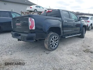 2021 GMC Canyon 4WD Denali with VIN 1GTG6EEN9M1221529, listed as a IAAI auction lot 41228498 with 67,727 mi miles. Bid and sale history available at carsss.com. Image 4.