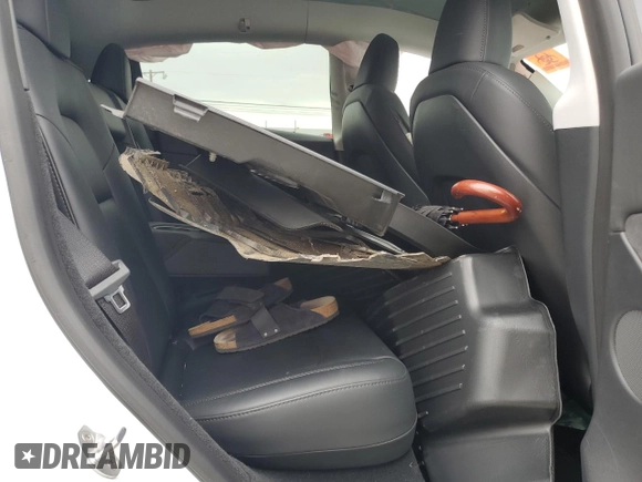 2023 Tesla Model Y Long Range z VIN 7SAYGDEE9PA070232, wystawiony jako Copart lot #55881805 z przebiegiem 38 276 mil mil oraz Szkoda całkowita • Salvage title. Historia ofert i sprzedaży dostępna na DreamBid. Obrazek 10.