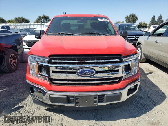 2019 Ford F-150 XL with VIN 1FTMF1E57KKC36789, listed as a Copart auction lot 69457224 with 26,509 mi miles and Salvage title. Bid and sale history available at DreamBid. Image 5.