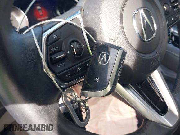 2023 Acura RDX Technology with VIN 5J8TC2H51PL007971, listed as a IAAI auction lot 42086494 with 39,615 mi miles and . Bid and sale history available at DreamBid. Image 11.
