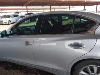 2015 Infiniti Q50 Premium with VIN JN1BV7AP9FM333610, listed as a IAAI auction lot 42029779 with 168,740 mi miles. Bid and sale history available at carsss.com. Image 14.