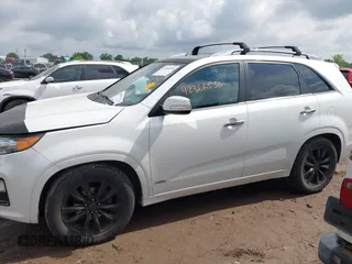 2012 Kia Sorento SX z VIN 5XYKWDA23CG231228, wystawiony jako IAAI lot #42366536 z przebiegiem 154 627 mil mil oraz . Historia ofert i sprzedaży dostępna na DreamBid. Obrazek 14.