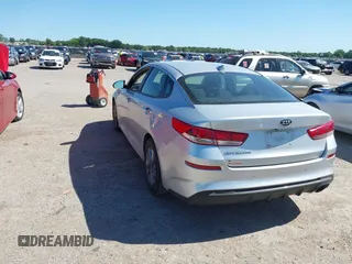 2019 Kia Optima LX with VIN 5XXGT4L3XKG294060, listed as a IAAI auction lot 42303397 with 127,081 mi miles and . Bid and sale history available at DreamBid. Image 3.
