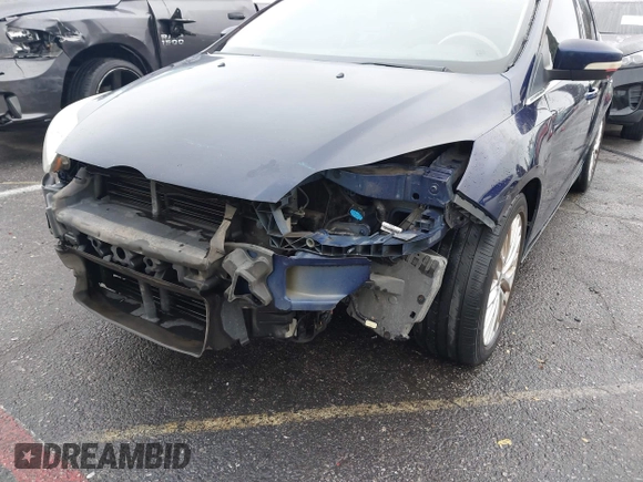 2012 Ford Focus SEL with VIN 1FAHP3H20CL149796, listed as a IAAI auction lot 41895850 with 144,668 mi miles. Bid and sale history available at carsss.com. Image 6.