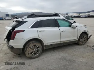2021 Cadillac XT5 FWD Premium Luxury z VIN 1GYKNCR41MZ154357, wystawiony jako Copart lot #86819564 z przebiegiem Nie podano mil oraz Nie do naprawy • Non repairable. Historia ofert i sprzedaży dostępna na DreamBid. Obrazek 3.