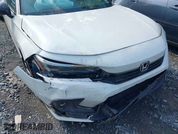 2023 Honda Civic Sport with VIN 2HGFE2F54PH512362, listed as a IAAI auction lot 41401479 with 12,672 mi miles and . Bid and sale history available at DreamBid. Image 6.