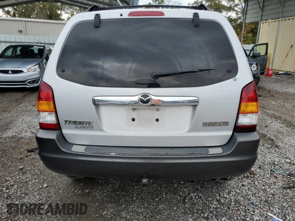 2003 Mazda Tribute LX with VIN 4F2YZ04153KM20941, listed as a Copart auction lot 82683264 with 195,240 mi miles and Salvage Title. Bid and sale history available at DreamBid. Image 6.