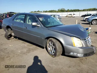 2006 Cadillac DTS 1SC z VIN 1G6KD57Y76U237062, wystawiony jako Copart lot #70920534 z przebiegiem 84 589 mil mil oraz Szkoda całkowita • Salvage title. Historia ofert i sprzedaży dostępna na DreamBid. Obrazek 4.