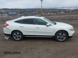 2013 Honda Crosstour EX-L z VIN 5J6TF2H52DL005559, wystawiony jako IAAI lot #41757271 z przebiegiem 171 850 mil mil oraz . Historia ofert i sprzedaży dostępna na DreamBid. Obrazek 13.