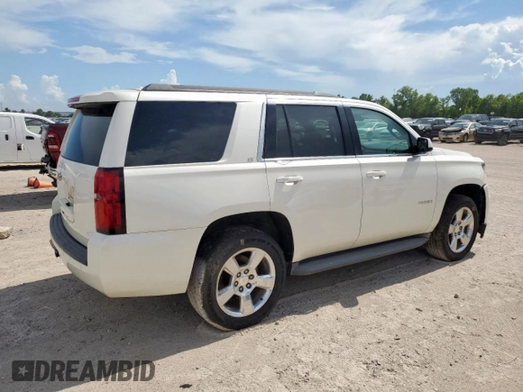 2015 Chevrolet Tahoe LT with VIN 1GNSCBKC5FR302611, listed as a Copart auction lot 62068165 with 184,136 mi miles and Salvage title. Bid and sale history available at DreamBid. Image 3.