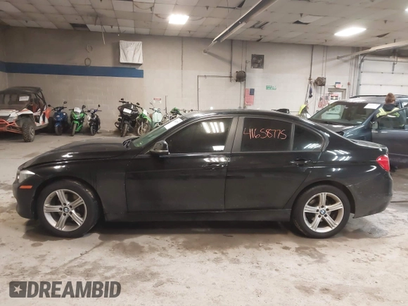 2015 BMW 3 Series 320i xDrive with VIN WBA3C3C54FK202055, listed as a IAAI auction lot 41658775 with 144,505 mi miles and . Bid and sale history available at DreamBid. Image 13.