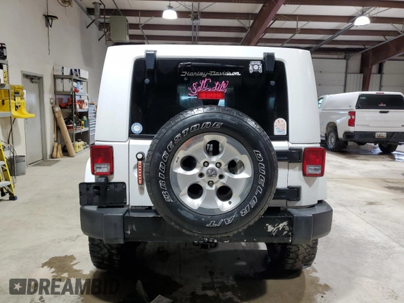 2008 Jeep Wrangler Unlimited Sahara с VIN 1J8GA59108L514034, выставлен на аукционе Copart как лот 58812215 с пробегом 191 800 миль миль и Списание • Salvage title. История ставок и продаж доступна на DreamBid. Изображение 6.