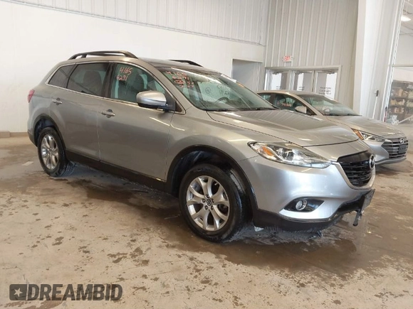 2015 Mazda CX-9 Touring with VIN JM3TB3CV5F0464675, listed as a IAAI auction lot 41656291 with 127,033 mi miles. Bid and sale history available at carsss.com. Image 1.