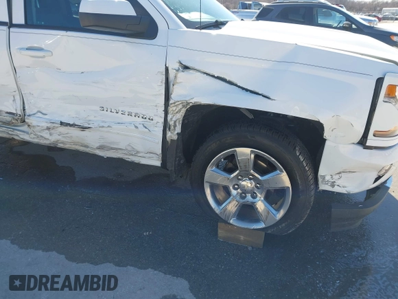 2018 Chevrolet Silverado 1500 LT with VIN 3GCUKREC3JG634354, listed as a IAAI auction lot 41734436 with 135,846 mi miles. Bid and sale history available at carsss.com. Image 6.