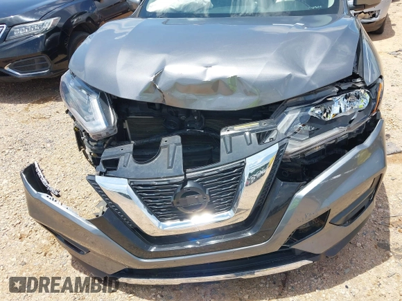 2017 Nissan Rogue S with VIN KNMAT2MV2HP543348, listed as a IAAI auction lot 42525372 with 128,842 mi miles and . Bid and sale history available at DreamBid. Image 6.