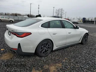 2023 BMW i4 eDrive40 with VIN WBY73AW01PFP77943, listed as a Copart auction lot 39385944 with 8,390 mi miles. Bid and sale history available at carsss.com. Image 3.