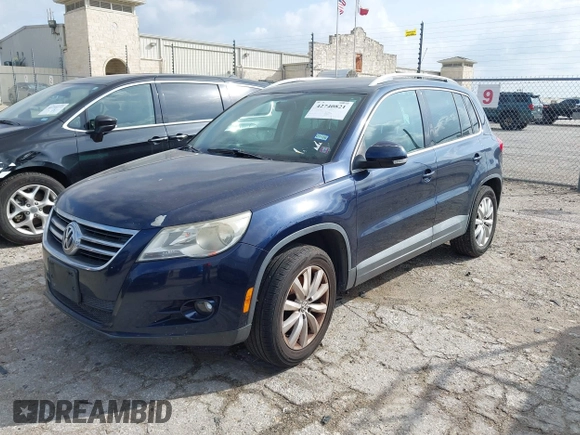 2011 Volkswagen Tiguan SE with VIN WVGAV7AX7BW530357, listed as a IAAI auction lot 42740821 with 170,636 mi miles and . Bid and sale history available at DreamBid. Image 2.