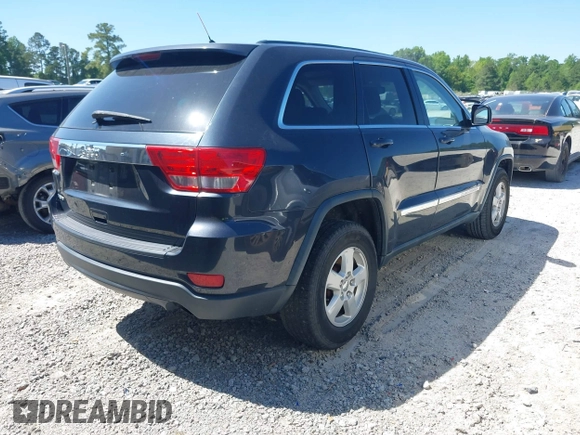 2012 Jeep Grand Cherokee Laredo with VIN 1C4RJEAG9CC223167, listed as a IAAI auction lot 42136098 with 152,715 mi miles. Bid and sale history available at carsss.com. Image 4.