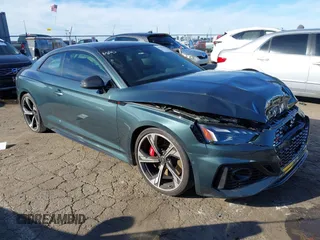 2021 Audi RS 5 z VIN WUANWAF50MA903670, wystawiony jako IAAI lot #41266483 z przebiegiem 36 200 mil mil oraz . Historia ofert i sprzedaży dostępna na DreamBid. Obrazek 1.