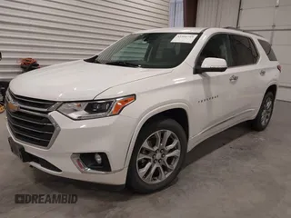 2021 Chevrolet Traverse Premier with VIN 1GNEVKKW7MJ218772, listed as a IAAI auction lot 42306743 with 106,898 mi miles and . Bid and sale history available at DreamBid. Image 2.