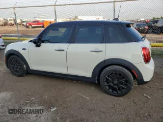 2021 MINI Hardtop 4 Door Oxford Edition with VIN WMWXU7C00M2N76797, listed as a Copart auction lot 56822934 with 44,839 mi miles and Salvage title. Bid and sale history available at DreamBid. Image 2.