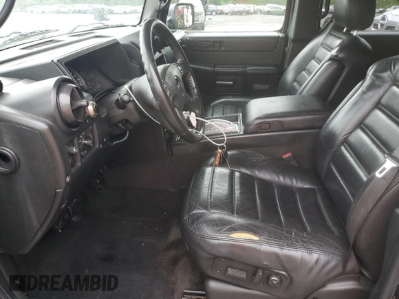 2006 Hummer H2 z VIN 5GRGN23U66H117438, wystawiony jako Copart lot #55833845 z przebiegiem 182 015 mil mil oraz Szkody całkowita. Historia ofert i sprzedaży dostępna na DreamBid. Obrazek 7.