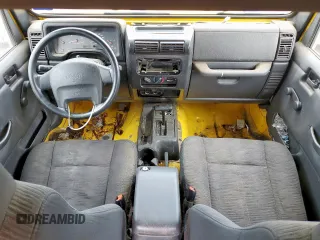 2004 Jeep Wrangler X с VIN 1J4FA39S34P745300, выставлен на аукционе Copart как лот 65454595 с пробегом 57 920 миль миль и Списание • Salvage title. История ставок и продаж доступна на DreamBid. Изображение 8.