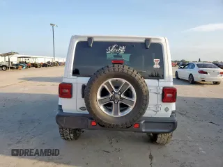 2019 Jeep Wrangler Unlimited Sahara z VIN 1C4HJXEG8KW527198, wystawiony jako Copart lot #60043115 z przebiegiem Nie podano mil oraz Szkoda całkowita • Salvage title. Historia ofert i sprzedaży dostępna na DreamBid. Obrazek 6.