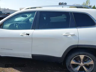 2019 Jeep Cherokee Limited with VIN 1C4PJLDBXKD487843, listed as a IAAI auction lot 41979449 with 104,545 mi miles. Bid and sale history available at carsss.com. Image 15.