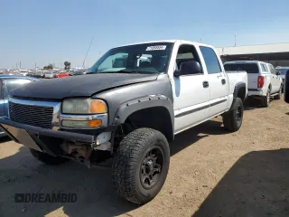 2005 GMC Sierra 1500 SLE with VIN 2GTEK13T151343052, listed as a Copart auction lot 71058554 with 210,609 mi miles and Salvage title. Bid and sale history available at DreamBid. Image 1.