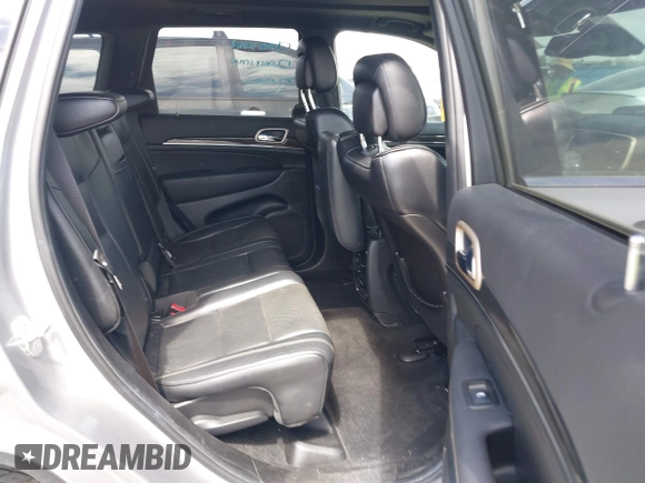 2014 Jeep Grand Cherokee Overland with VIN 1C4RJECG0EC291048, listed as a IAAI auction lot 41883941 with 81,871 mi miles. Bid and sale history available at carsss.com. Image 8.