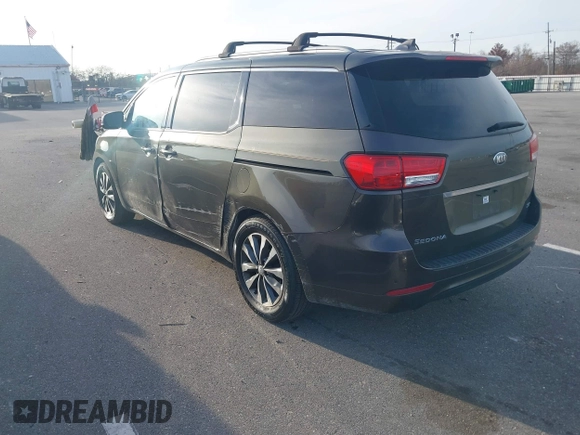 2016 Kia Sedona EX with VIN KNDMC5C1XG6159271, listed as a IAAI auction lot 41409277 with 95,696 mi miles. Bid and sale history available at carsss.com. Image 3.