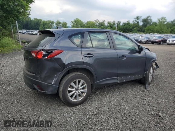 2015 Mazda CX-5 Sport with VIN JM3KE4BYXF0511249, listed as a Copart auction lot 63310695 with 208,615 mi miles and Salvage title. Bid and sale history available at DreamBid. Image 3.
