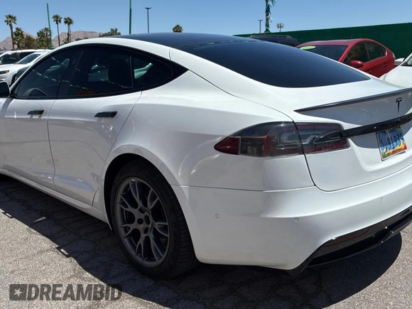 2021 Tesla Model S Plaid с VIN 5YJSA1E64MF447124, выставлен на аукционе Copart как лот 55833265 с пробегом 61 623 миль миль и Чистый • Clean title. История ставок и продаж доступна на DreamBid. Изображение 3.