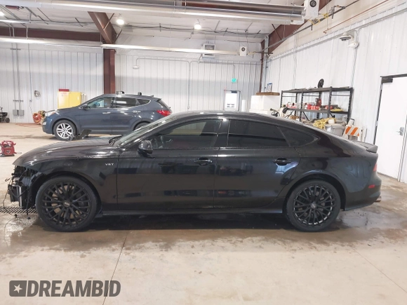 2015 Audi S7 with VIN WAUW2AFC0FN015327, listed as a IAAI auction lot 41964788 with 145,953 mi miles. Bid and sale history available at carsss.com. Image 15.