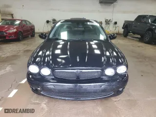 2005 Jaguar X-Type 3.0L with VIN SAJWA51C05WE41522, listed as a Copart auction lot 62837564 with 91,885 mi miles and Clean Title. Bid and sale history available at carsss.com. Image 5.