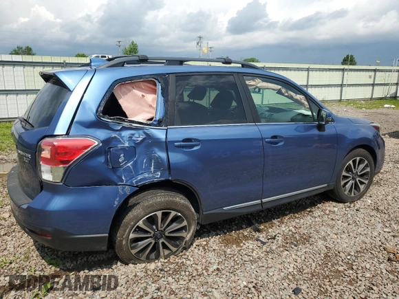 2017 Subaru Forester Touring with VIN JF2SJGWC9HH574837, listed as a Copart auction lot 60128065 with Not provided miles and Salvage title. Bid and sale history available at DreamBid. Image 3.