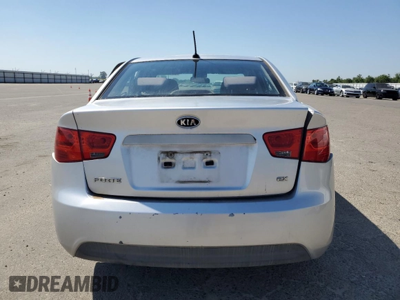 2010 Kia Forte EX z VIN KNAFU4A24A5054277, wystawiony jako Copart lot #56007995 z przebiegiem 218 782 mil mil oraz Szkody całkowita. Historia ofert i sprzedaży dostępna na DreamBid. Obrazek 6.