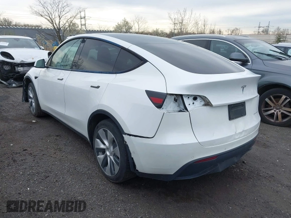 2022 Tesla Model Y Long Range z VIN 7SAYGDEE7NF389788, wystawiony jako IAAI lot #42014111 z przebiegiem 37 606 mil mil oraz . Historia ofert i sprzedaży dostępna na DreamBid. Obrazek 3.