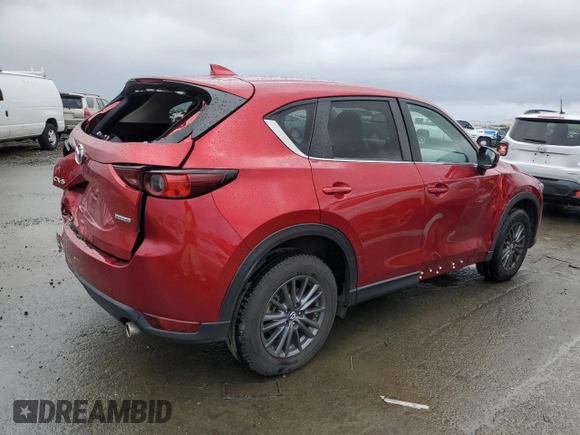 2021 Mazda CX-5 Touring with VIN JM3KFACM8M0406987, listed as a Copart auction lot 45241535 with 57,673 mi miles and Salvage Title. Bid and sale history available at carsss.com. Image 3.