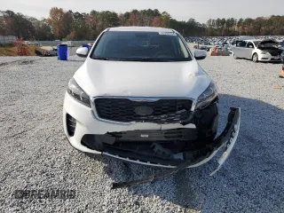 2020 Kia Sorento LX z VIN 5XYPG4A54LG620991, wystawiony jako Copart lot #83208104 z przebiegiem 77 189 mil mil oraz Szkoda całkowita • Salvage title. Historia ofert i sprzedaży dostępna na DreamBid. Obrazek 5.