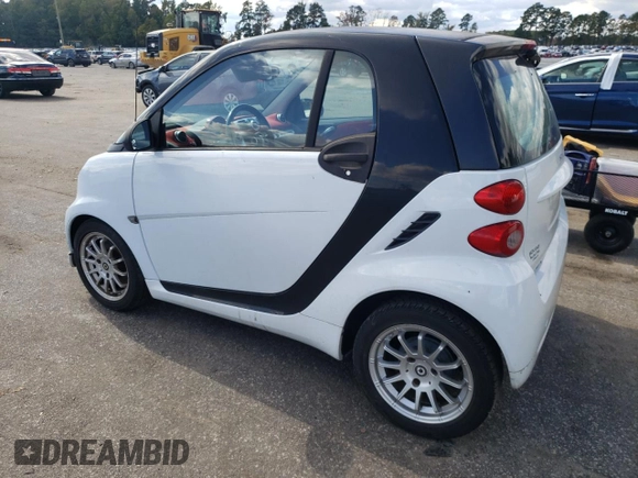 2011 Smart fortwo Pure with VIN WMEEJ3BAXBK447292, listed as a Copart auction lot 73308384 with 35,166 mi miles and Salvage title. Bid and sale history available at DreamBid. Image 2.