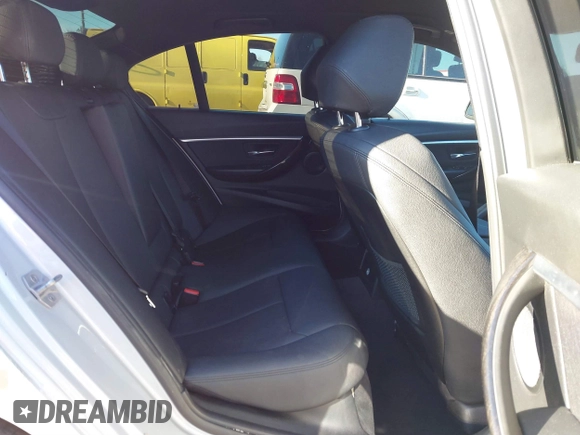 2018 BMW 3 Series 330i with VIN WBA8B9G58JNU97318, listed as a IAAI auction lot 41205434 with 62,582 mi miles and . Bid and sale history available at DreamBid. Image 8.