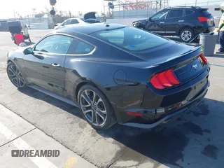 2018 Ford Mustang EcoBoost z VIN 1FA6P8TH4J5104877, wystawiony jako IAAI lot #42188807 z przebiegiem 60 967 mil mil oraz . Historia ofert i sprzedaży dostępna na DreamBid. Obrazek 3.