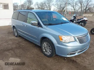 2013 Chrysler Town & Country Touring-L with VIN 2C4RC1CG0DR647233, listed as a IAAI auction lot 41943436 with 197,542 mi miles. Bid and sale history available at carsss.com. Image 1.