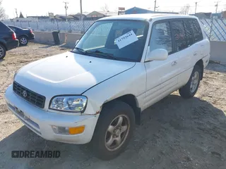 2000 Toyota RAV4 with VIN JT3GP10VXY7065795, listed as a IAAI auction lot 41792644 with 176,444 mi miles and . Bid and sale history available at DreamBid. Image 2.