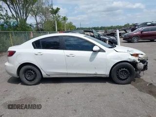 2013 Mazda 3 i SV with VIN JM1BL1TF3D1795969, listed as a IAAI auction lot 42075242 with 169,331 mi miles. Bid and sale history available at carsss.com. Image 13.