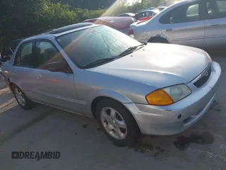 1999 Mazda Protege ES z VIN JM1BJ2212X0194256, wystawiony jako IAAI lot #42452060 z przebiegiem 208 002 mil mil oraz . Historia ofert i sprzedaży dostępna na DreamBid. Obrazek 1.